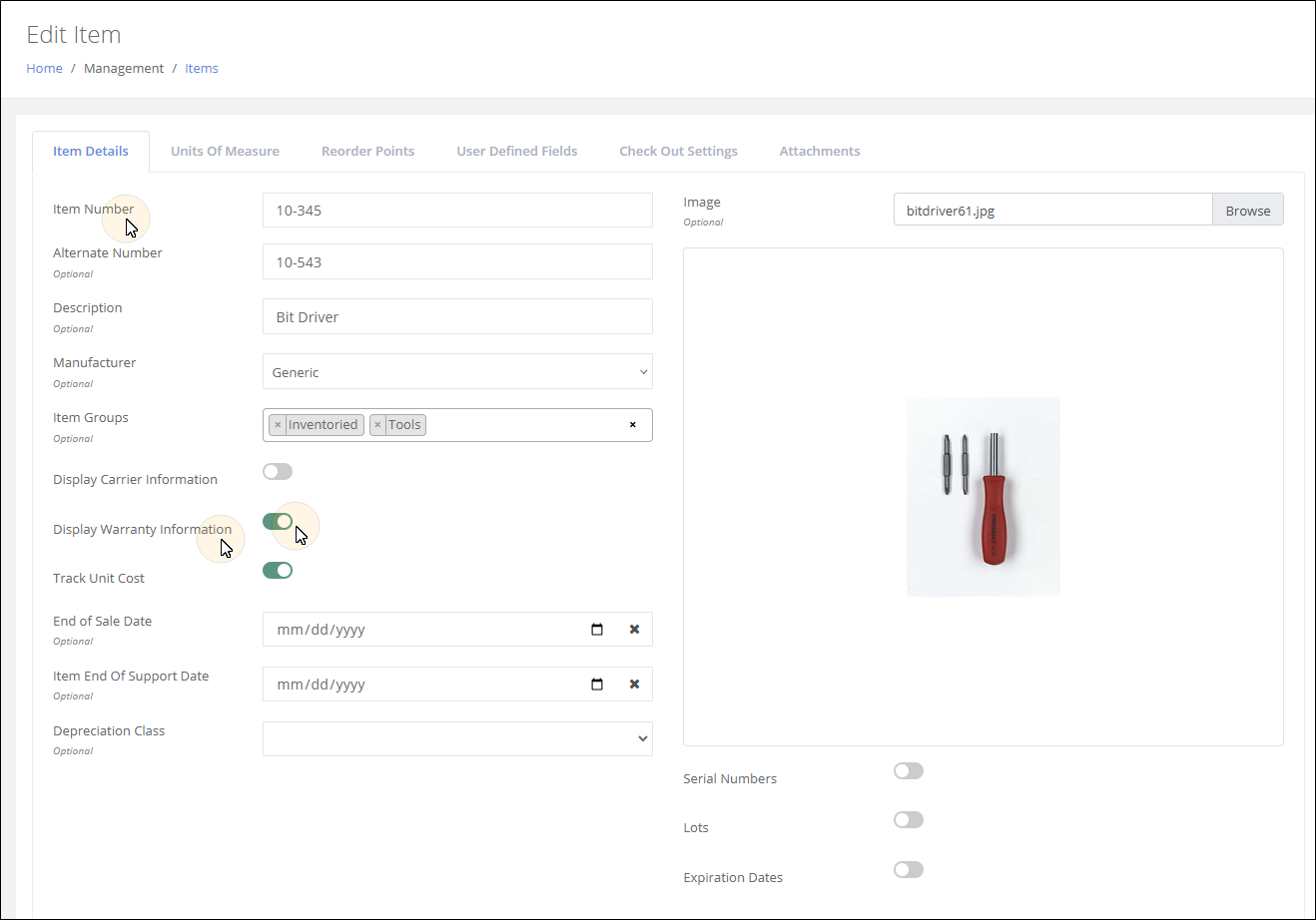 Edit Item page on the Item Details tab with the Display Warranty Information toggle enabled