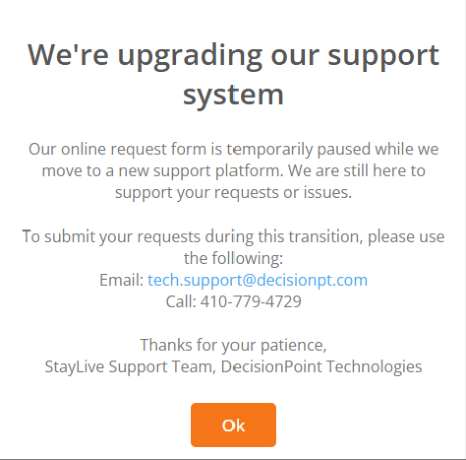 "We're upgrading our support system" splash screen with interim support contact details and an Ok button